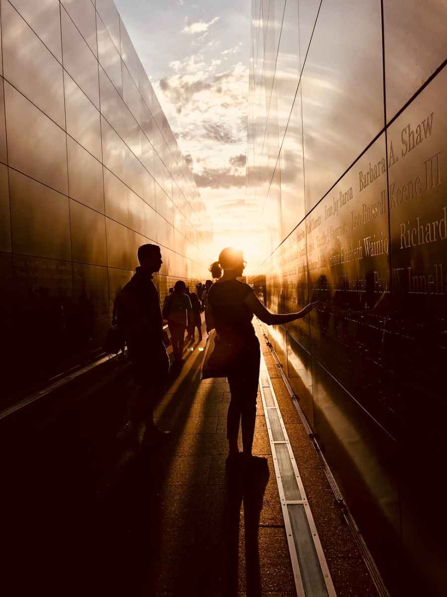 woman touching a black wall